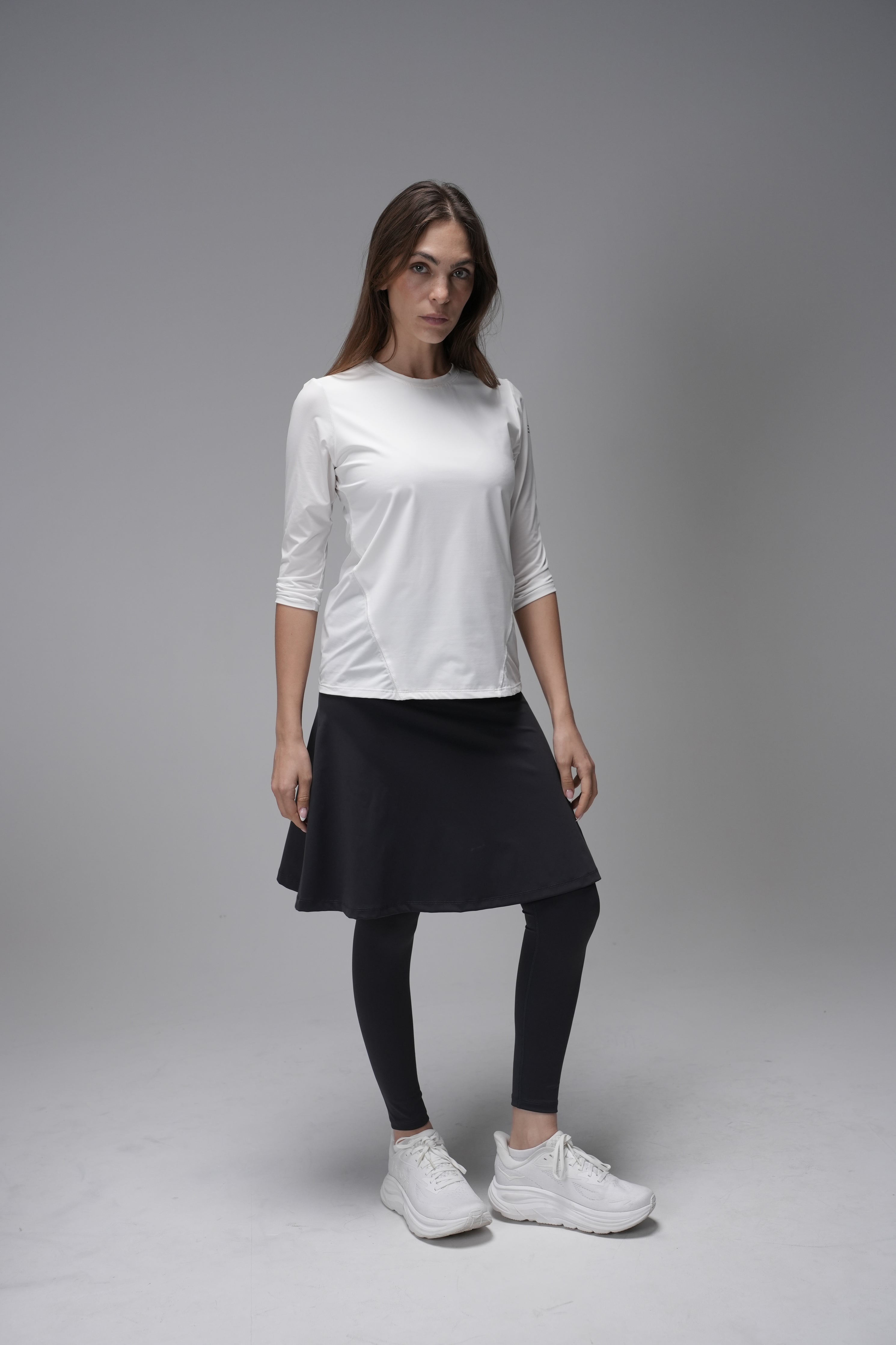 מכנסי חצאית LUX Motion - עם גזרה גבוהה וכיסים. אורך מעל לברך