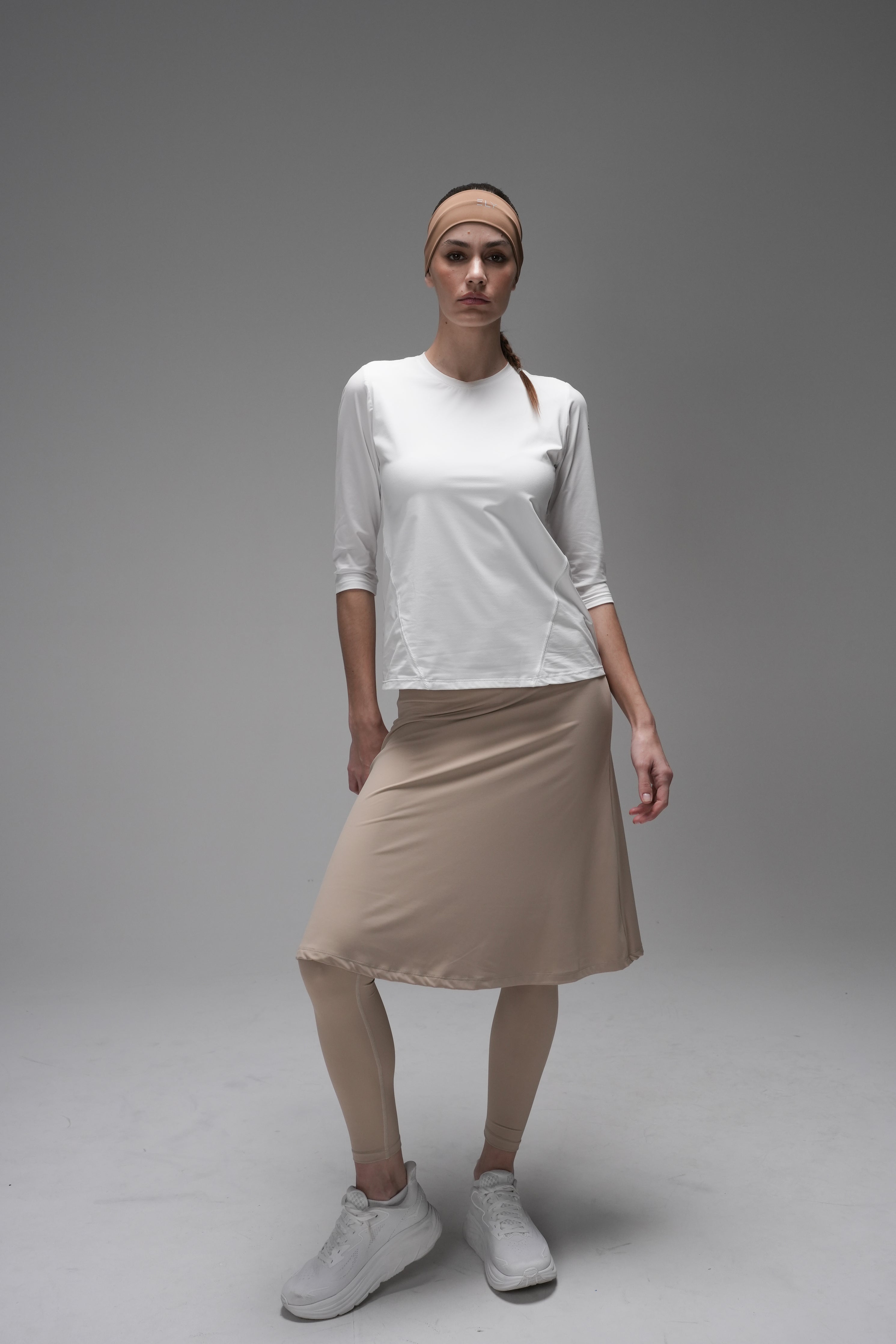 מכנסי חצאית LUX Motion - עם גזרה גבוהה וכיסים. אורך מתחת לברך